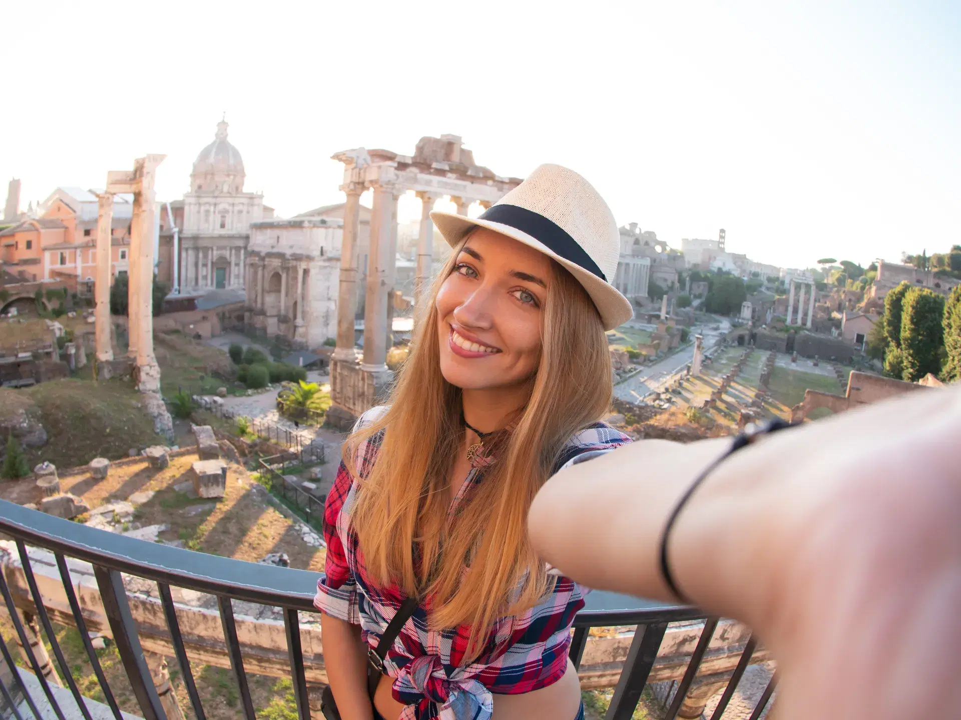 Traveler taking a selfie in a city square